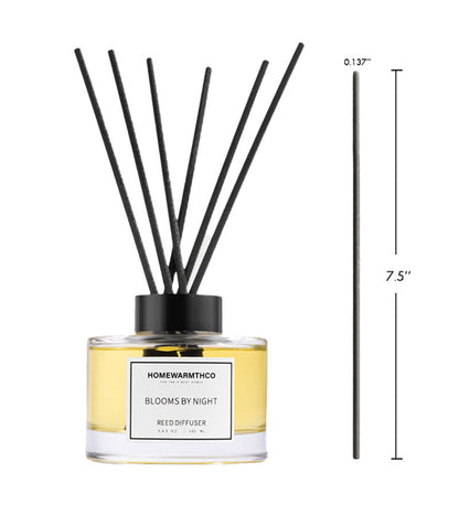 Reed diffuser labeled 'Homewarmthco Blooms by Night' with black reeds and measurements on a white background