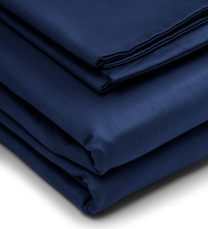 A set of blue duvet covers displayed on a white background