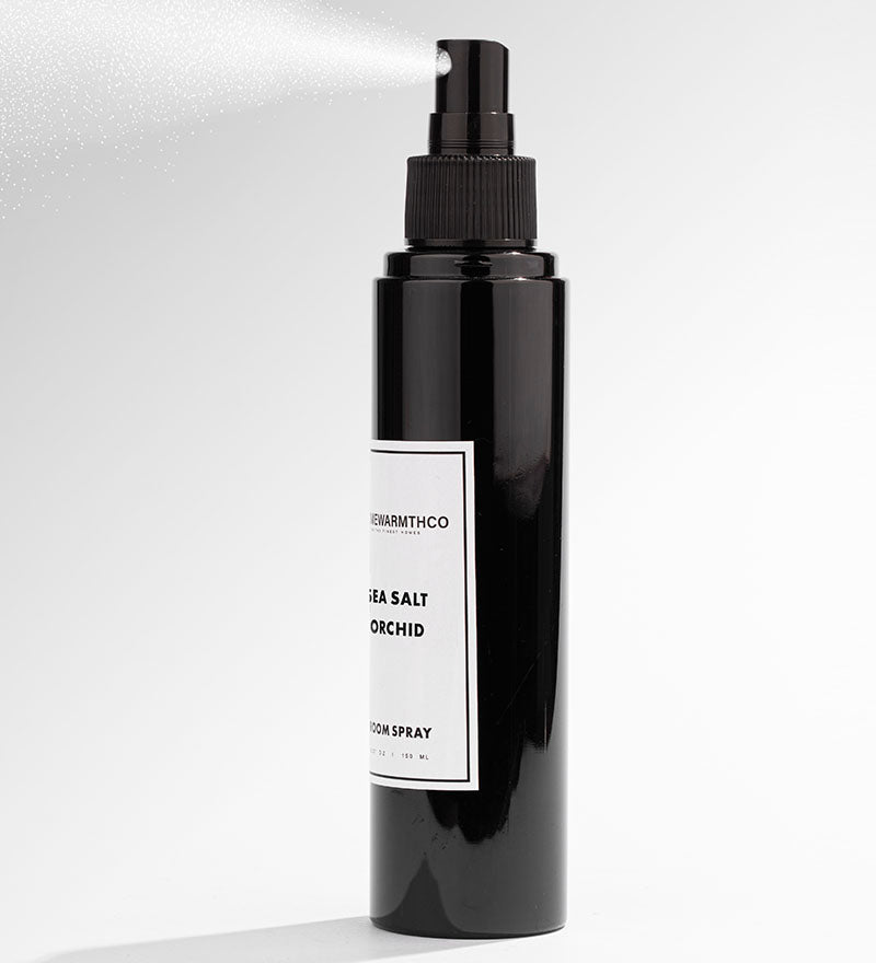 A black bottle of Sea Salt Orchid room spray