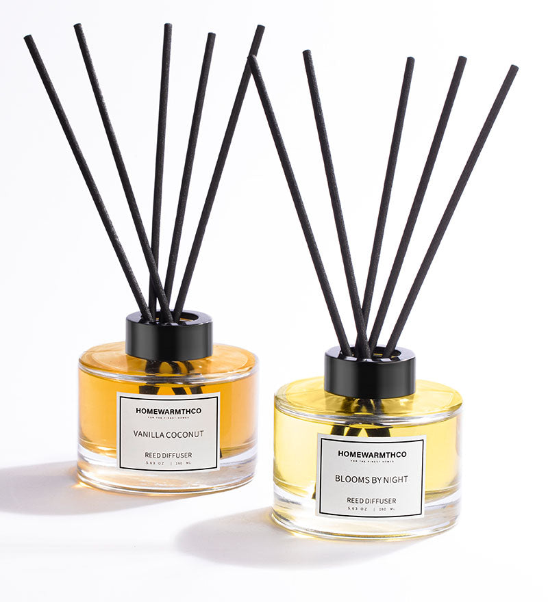 A Vanilla Coconut scented reed diffuser and Blooms By Night reed diffuser by HomeWarmthCo