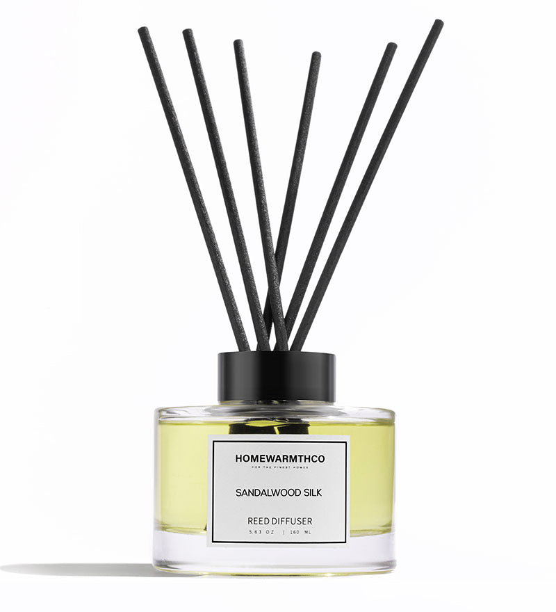 A luxury reed diffuser from HomeWarmthCo with sandalwood silk fragrance