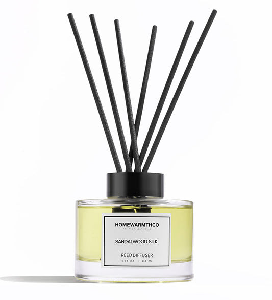 A luxury reed diffuser from HomeWarmthCo with sandalwood silk fragrance
